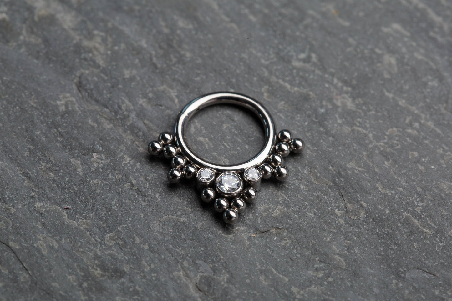 Triple CZ Crystal and Ball Cluster Lined Hoop Cartilage Helix Daith Septum Hinged Segment Ring
- G23 Implant Grade Titanium