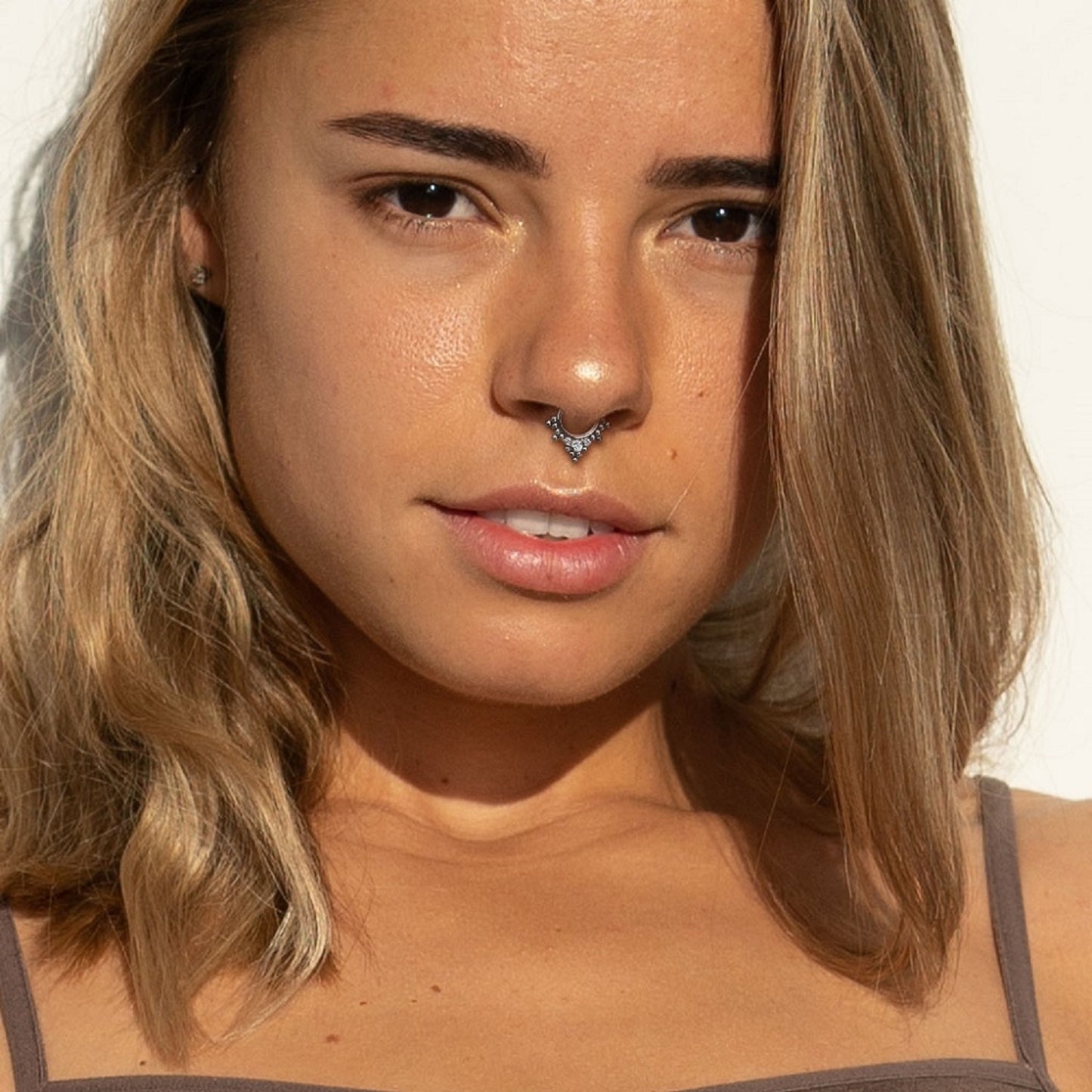Triple CZ Crystal and Ball Cluster Lined Hoop Cartilage Helix Daith Septum Hinged Segment Ring
- G23 Implant Grade Titanium